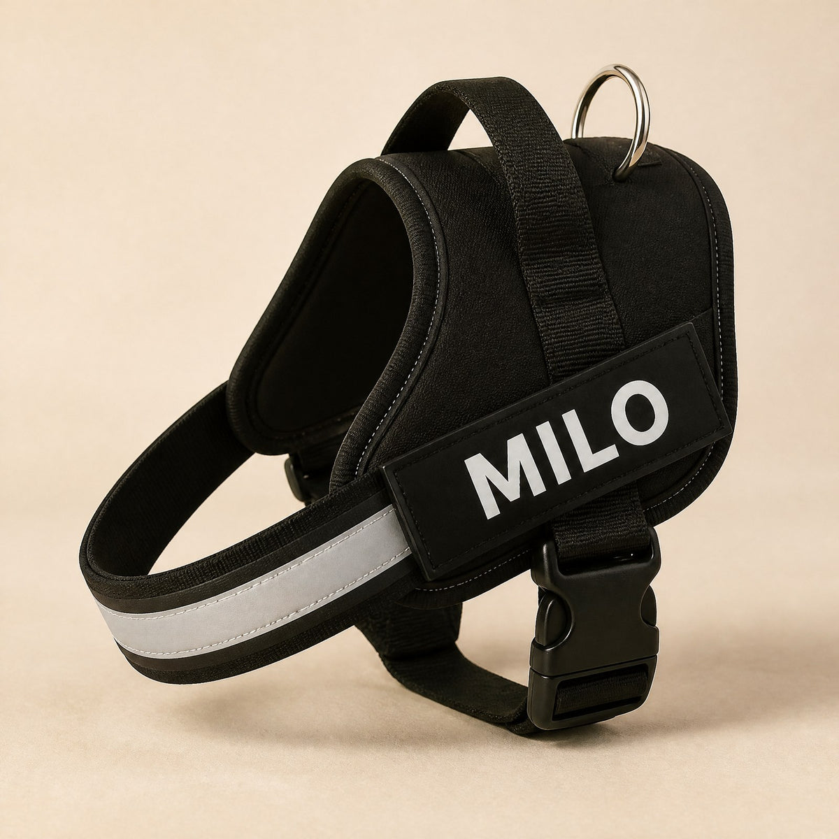 Black personalized no-pull dog harness with a MILO name patch
